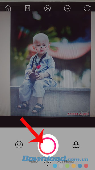 Nhấn vào nút hình tròn