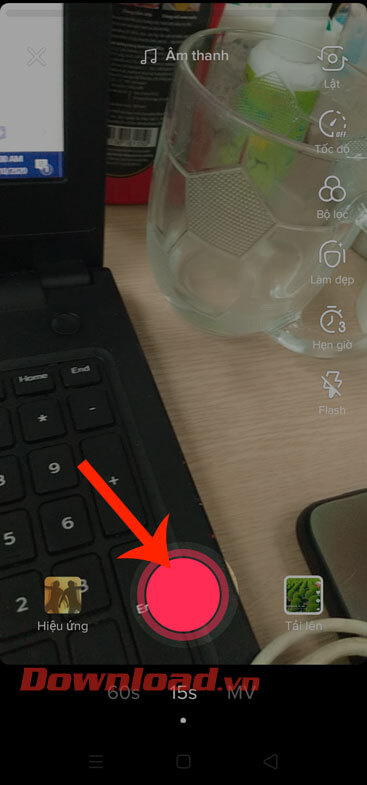 Ấn vào biểu tượng hình tròn 