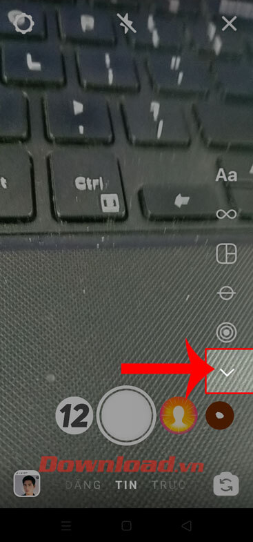 Nhấn vào biểu tượng mũi tên