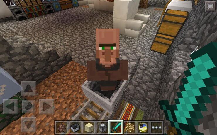 Villager Minecraft ngồi trong minecart