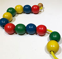 Giáo án mầm non: Dạy trẻ xâu vòng màu đỏ