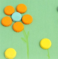 Giáo án mầm non: Dán nắp chai tạo hình bông hoa